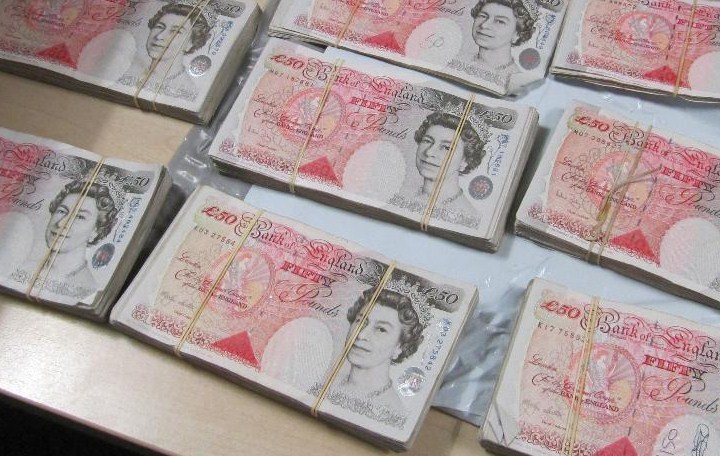 stacks of £50 notes